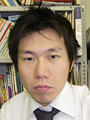 村上毅記者